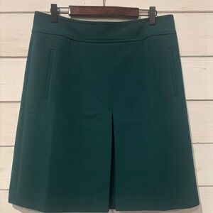 Loft Teal Midi Skirt in size 8. Pockets . Back slit . Great condition!